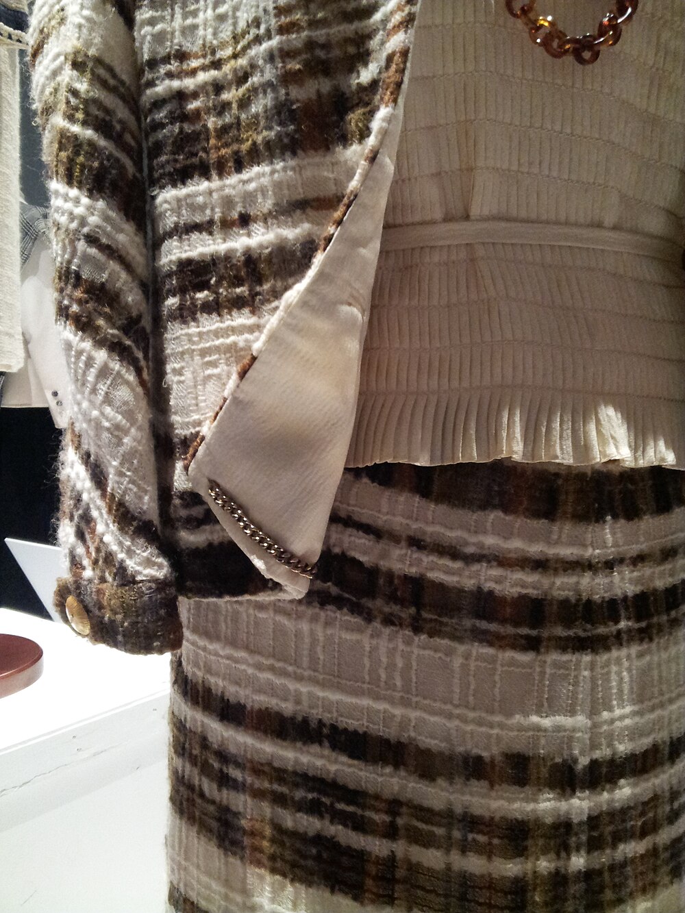 Chanel 1965 Suit. Licensed photograph, not an official campaign image.